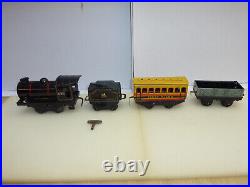 Hornby Meccano clockwork tin tender locomotive and 2 wagons, O scale + Video